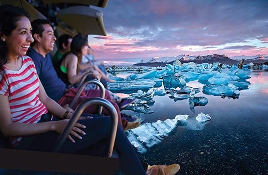 A group of people on a flight ride, superimposed over a view ice floes